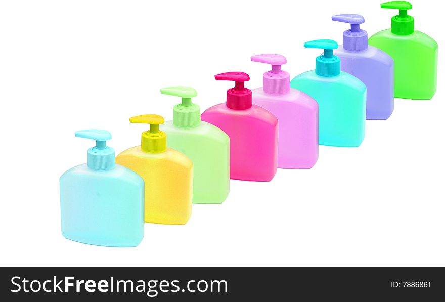 Lots of colourful bottles of handwash on white. Lots of colourful bottles of handwash on white