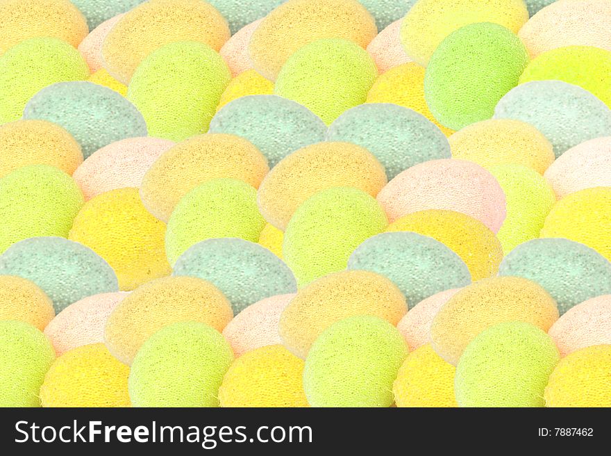 Shot filled with coloured eggs an deal background