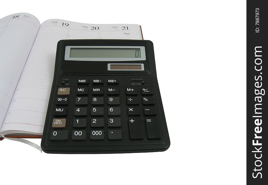 Notebook and calculator in white background, isolated