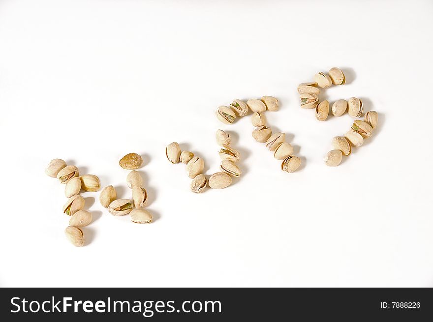Pistachio nuts isolated on white