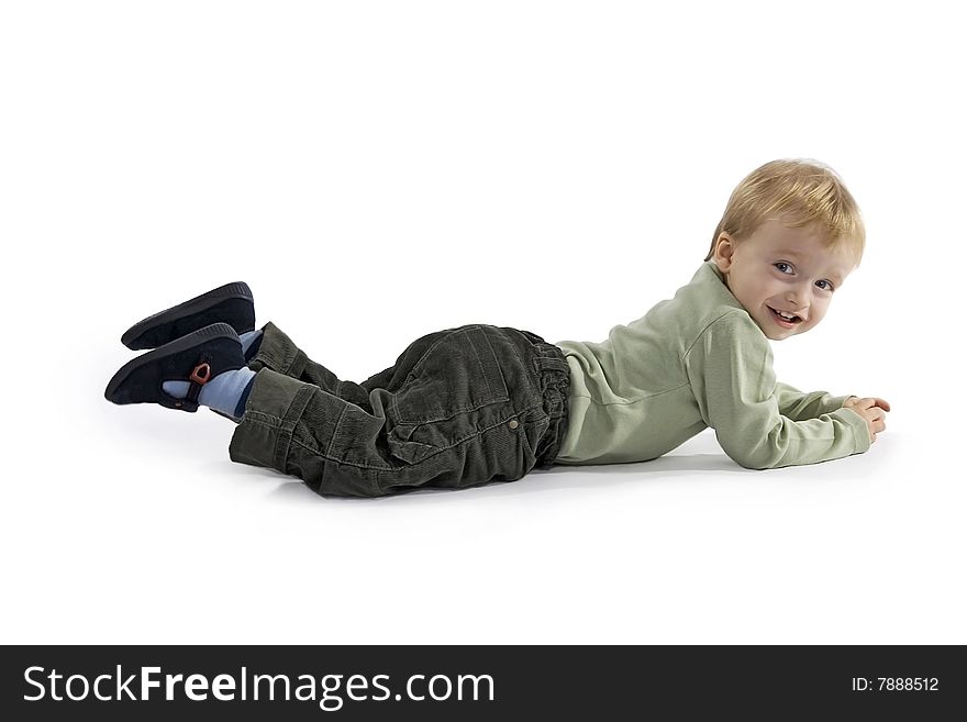 Merry recumbent boy on egg white background. Merry recumbent boy on egg white background