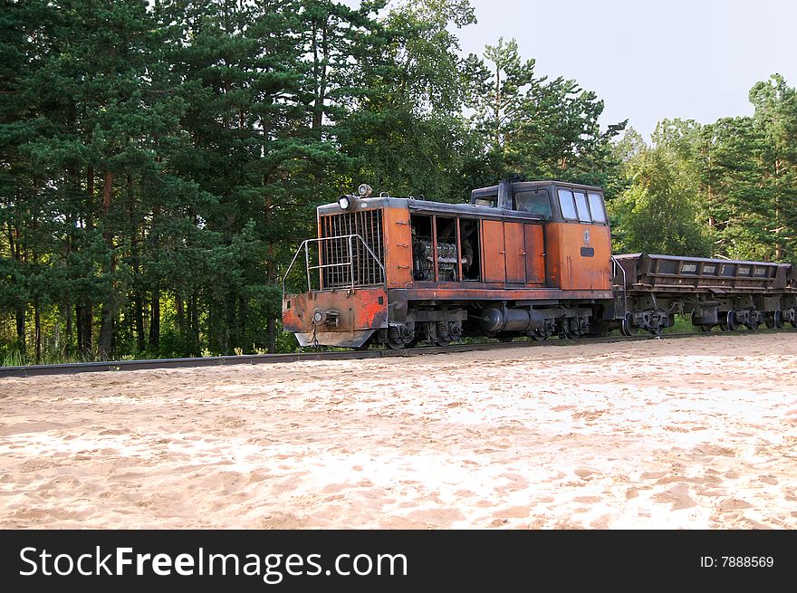 Old rusty diesel locomotive in the forest. Old rusty diesel locomotive in the forest