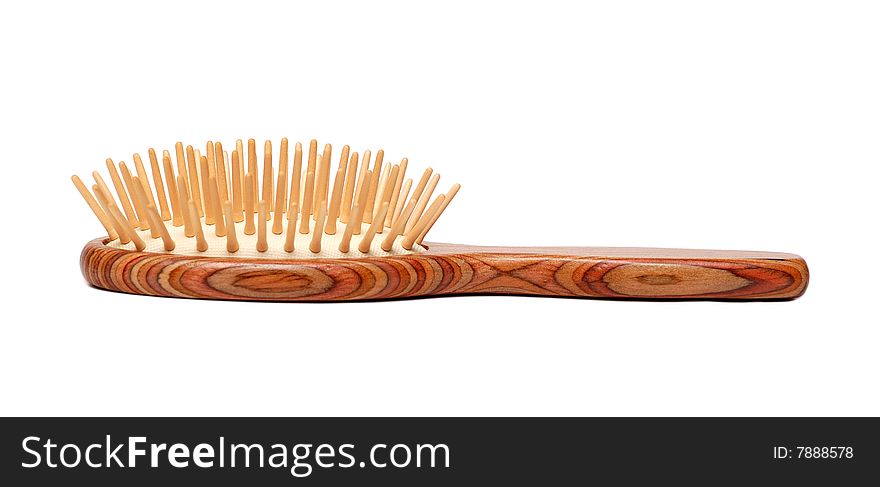 Wooden hairbrush  isolated over white background