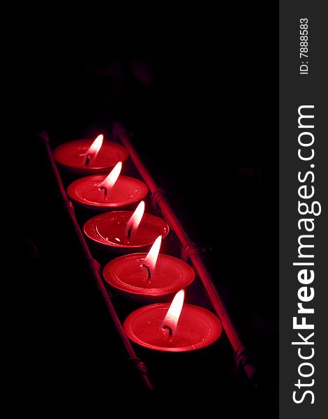 Many Candles On Dark Background