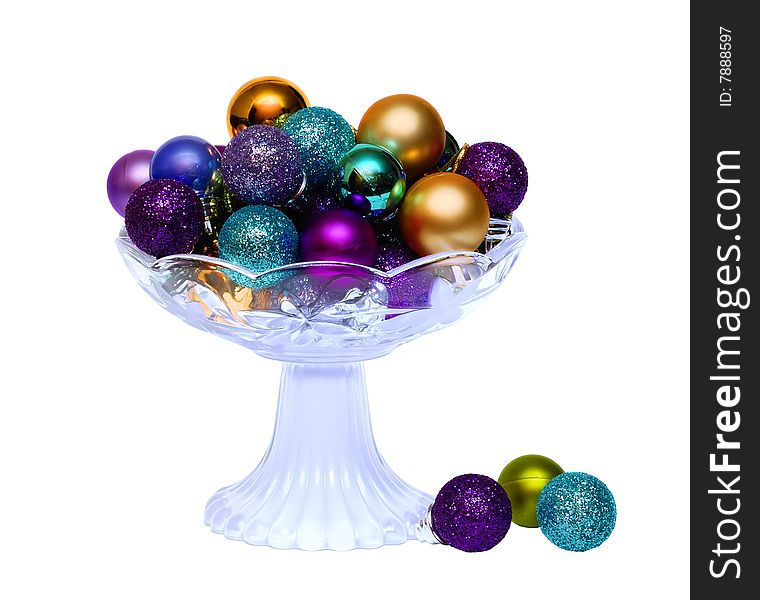 Colorful balls in vase isolated over white background