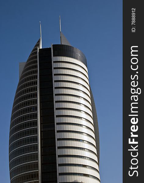 Looking upward on a high modern office building. Looking upward on a high modern office building
