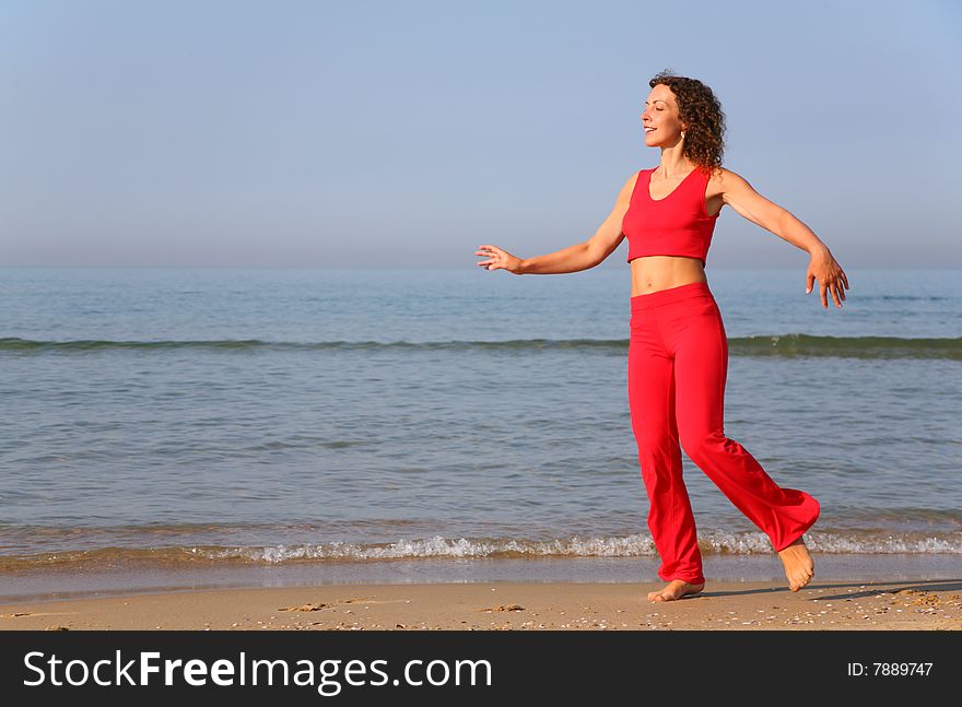 Young Woman On Shore Of Sea