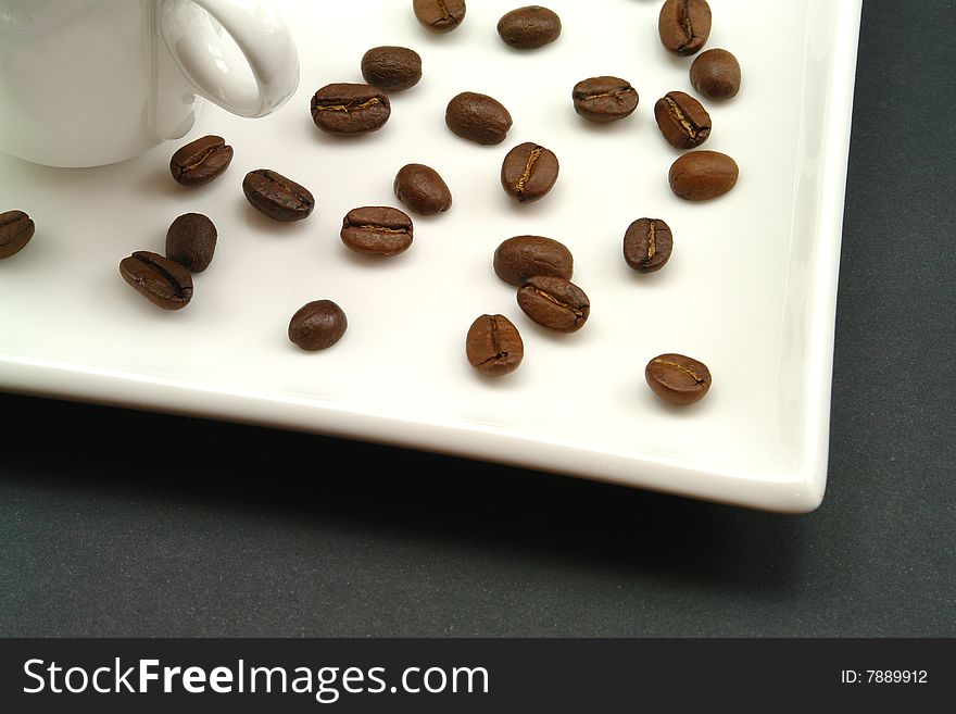 Aroma bean coffe white background and cup. closeup.