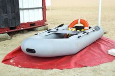 Inflatable Rescue Boat. Gray Inflatable Boat On The Beach In The Sand Royalty Free Stock Photos Inflatable Rescue Boat. Gray Inflatable Boat On The Beach In The Sand Royalty Free Stock Photos