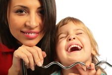 Woman And Girl Laugh Loudly Stock Photo