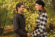 Loving Couple In An Autumnal Park Royalty Free Stock Images