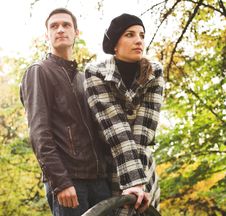 Loving Couple In Autumnal Park Royalty Free Stock Images