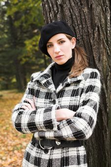 Young Woman In Autumnal Park Royalty Free Stock Photography