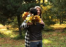 Loving Couple In An Autumnal Park Stock Images
