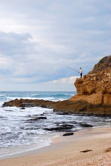 Fisherman On A Rock Stock Photos Fisherman On A Rock Stock Photos