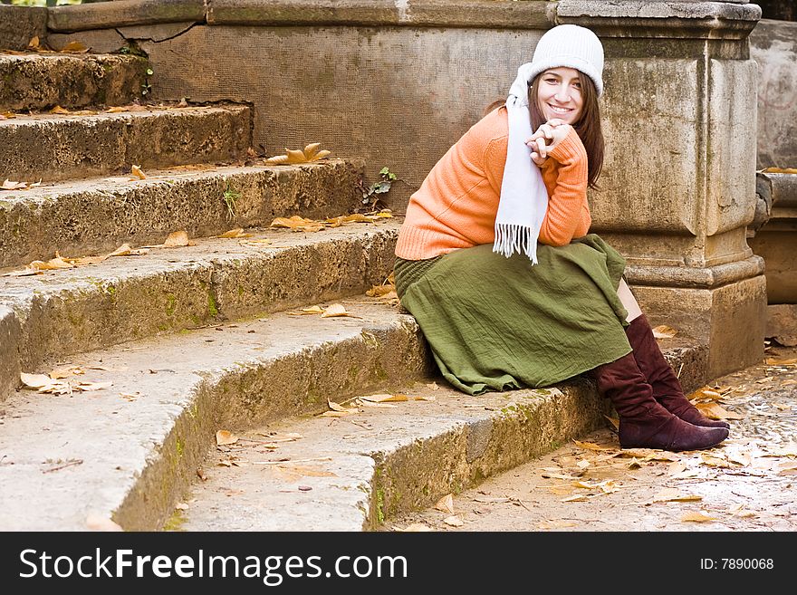 Young happy woman wearing winter clothing.