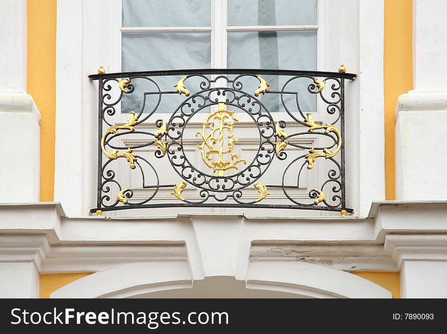 Baroque lattice on  facade of house. Peterhof. Petersburg.
