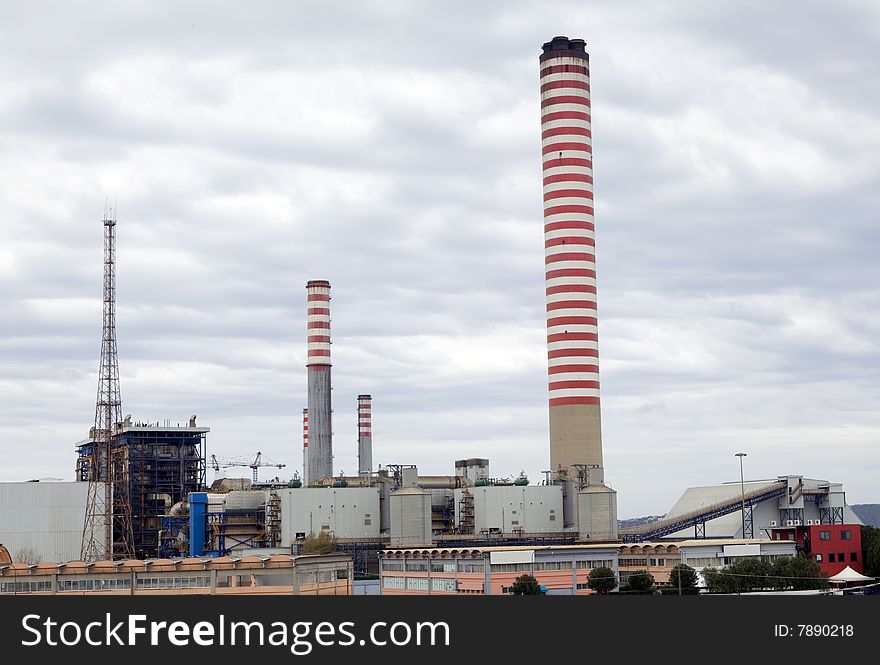 Industrial production, chimney withe and red