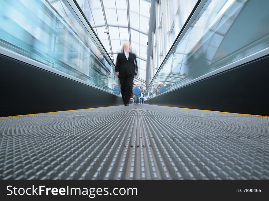 People on escalator