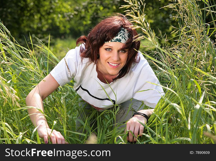 Young woman in grass