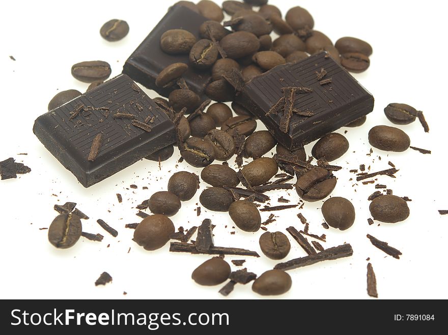 Chocolate square and coffee beans. Chocolate square and coffee beans