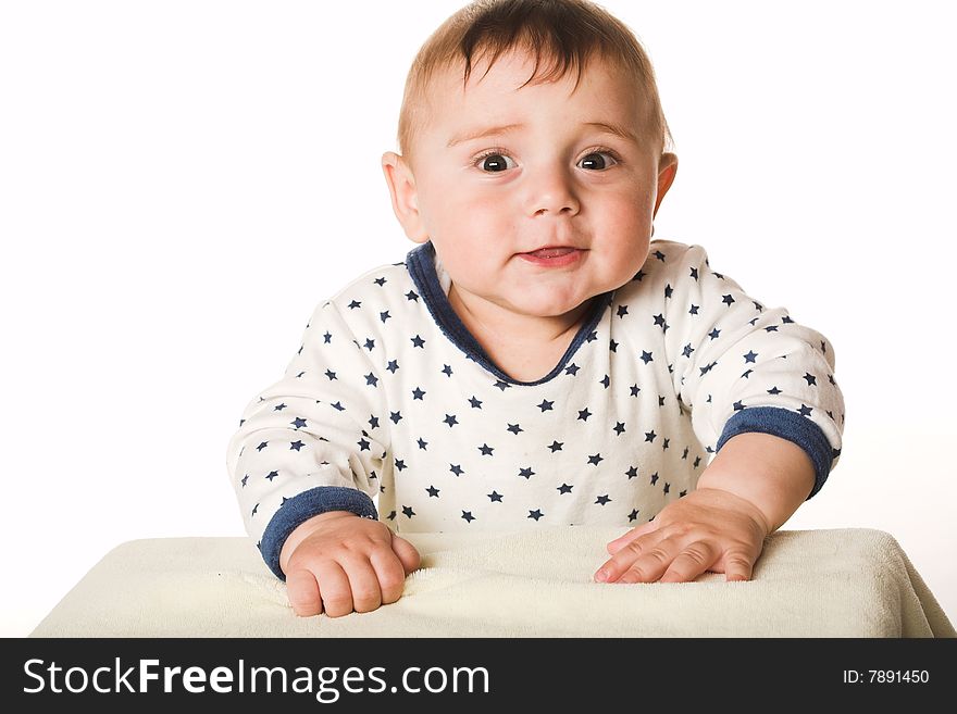 Close-up studio portrait of a cute child