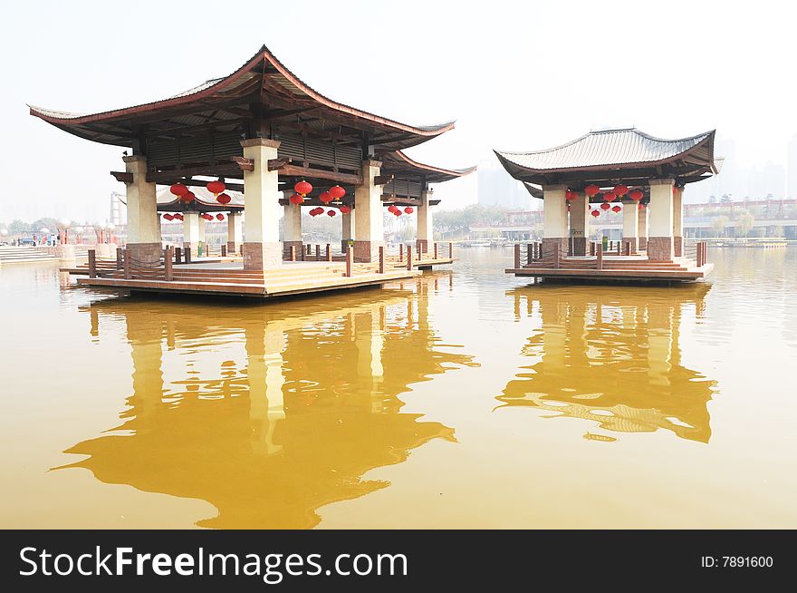 The tow pavilions of traditional Chinese ancient style in the middle of a lake. The tow pavilions of traditional Chinese ancient style in the middle of a lake.