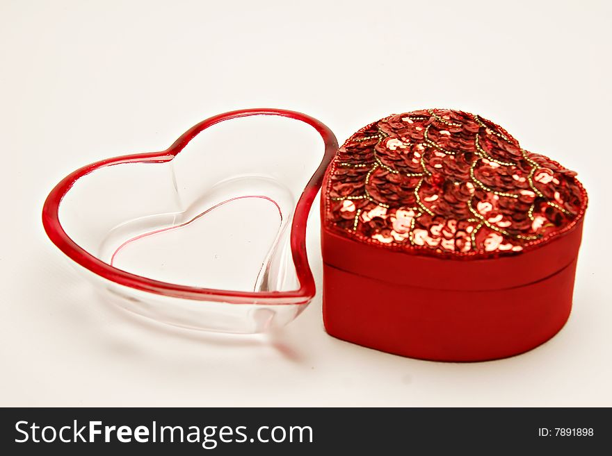 Isolated shot of two heart shaped containers. Isolated shot of two heart shaped containers.