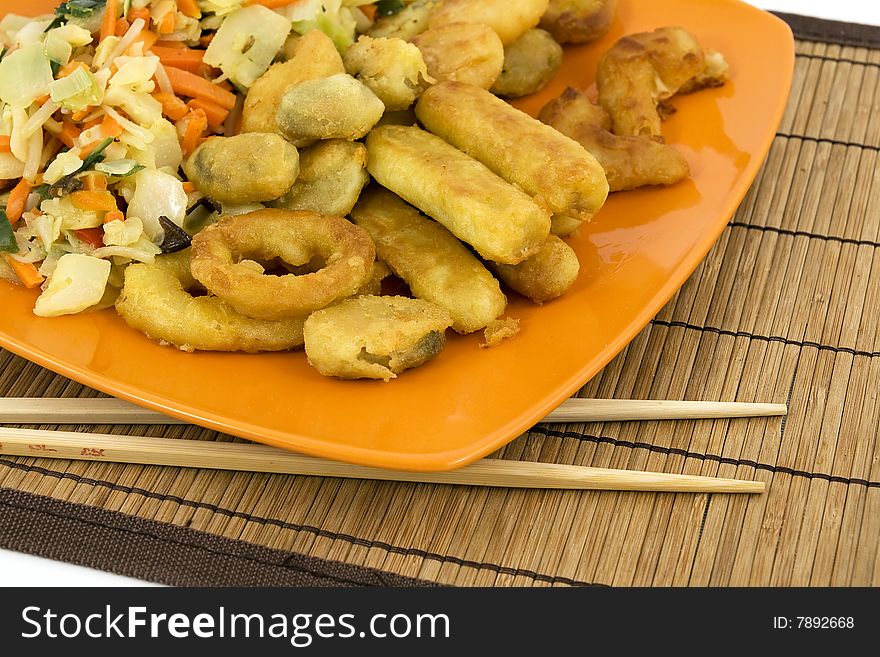 Closeup of seafood on a plate on reed pad. Closeup of seafood on a plate on reed pad.