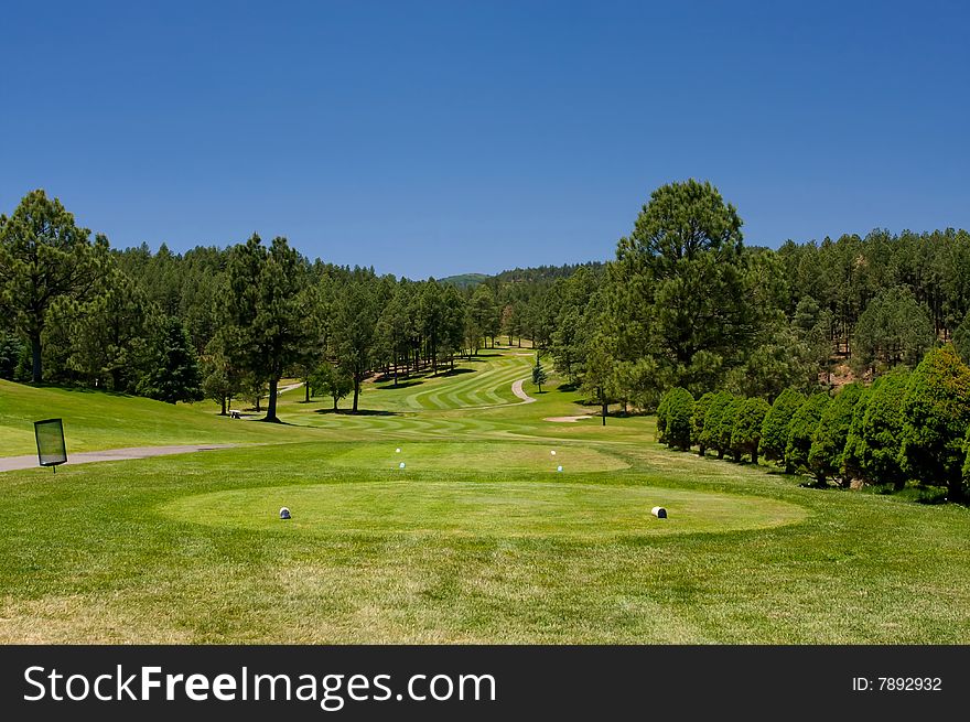 An image of  an Arizona golf course on a bright summer day. An image of  an Arizona golf course on a bright summer day