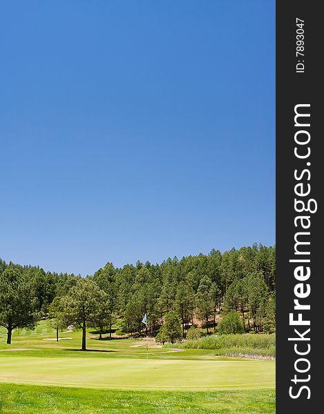 An image of a vibrant golf hole in Arizona. An image of a vibrant golf hole in Arizona