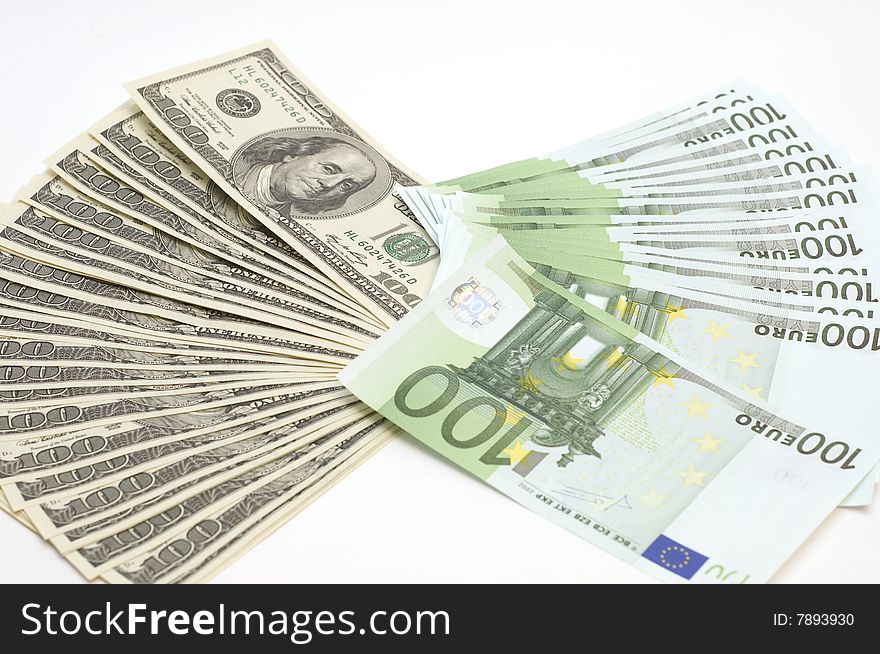 Many Euro And Dollars On White Background