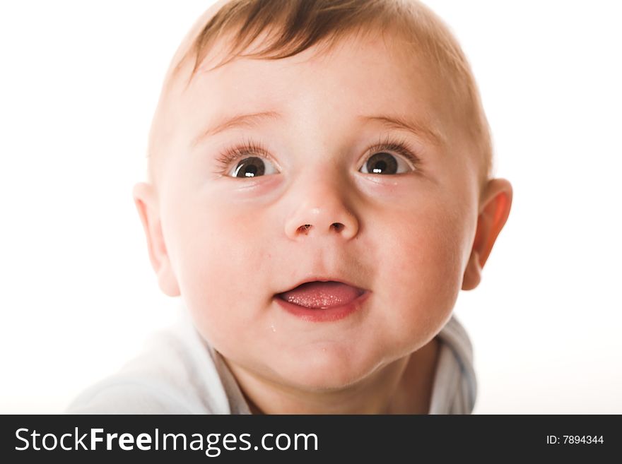 Close-up studio portrait of a cute child