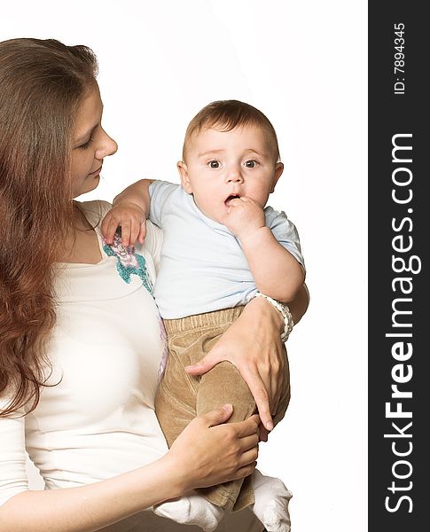 Studio portrait of a young mother with her child. Studio portrait of a young mother with her child