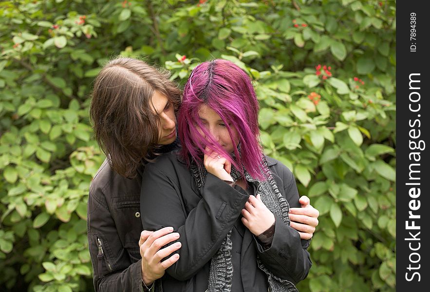 Young and beautiful boy  and girl  walking in park. Young and beautiful boy  and girl  walking in park