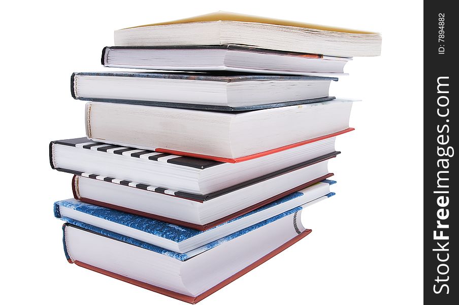 Stack of different books isolated on white background