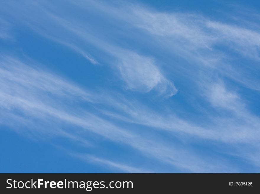 Beautiful clouds in a blue sky - background