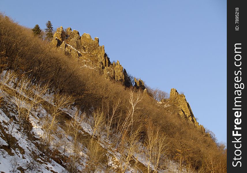 A winter landscape at a mountain slope