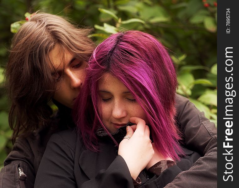 Young and beautiful boy  and girl  walking in park. Young and beautiful boy  and girl  walking in park