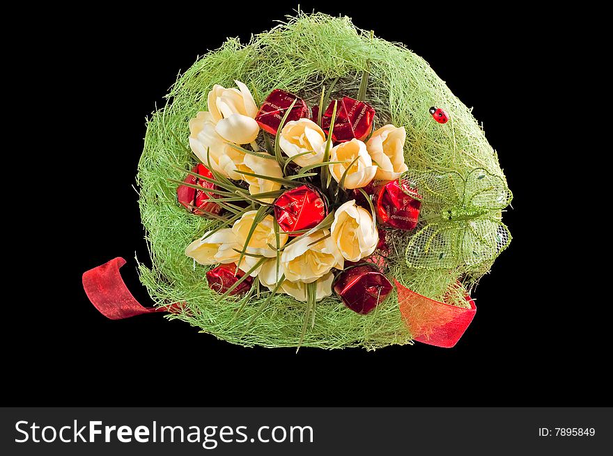 Photo of bouquet of artificial flowers isolated on black background