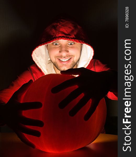 Awesome man holds ball of light in his hands. Awesome man holds ball of light in his hands