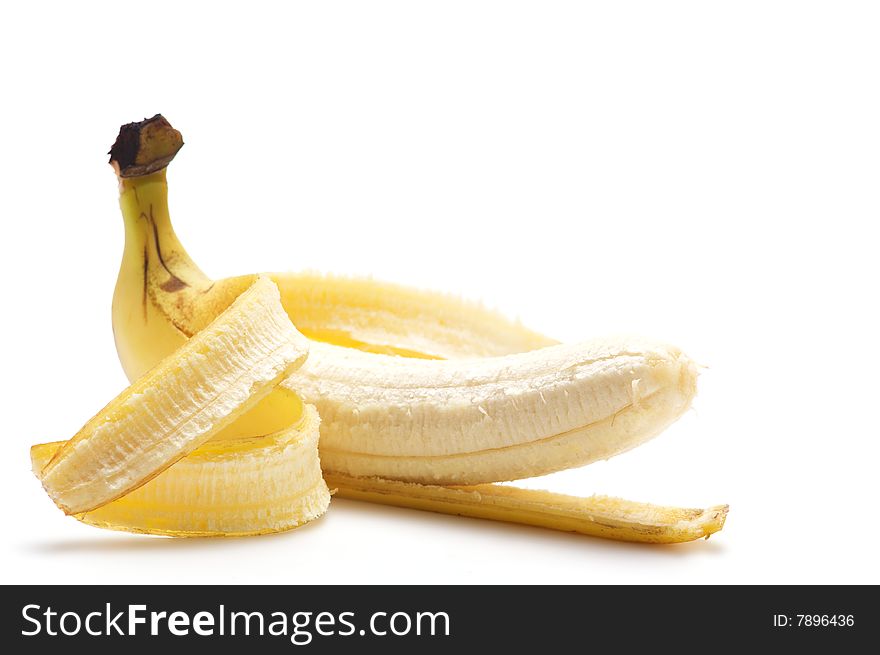 Cleaned banana isolated on a white background.