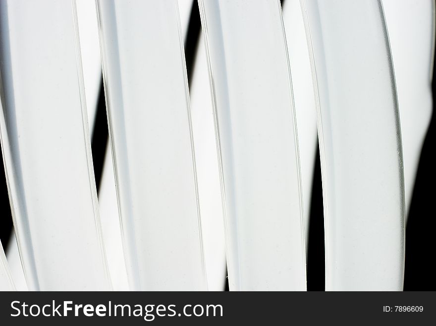 Abstract black and white background (closeup of an energy-saving lamp)