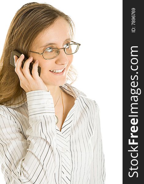 Young business woman with a cell phone isolated on a white background.