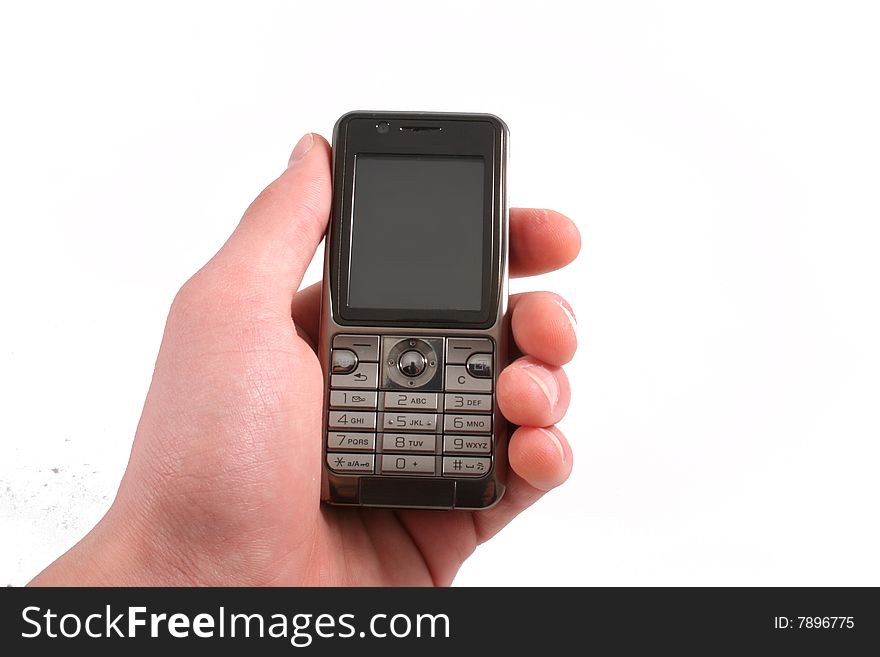 Mobile phone isolated on white. Hand is holding or pushing a button.