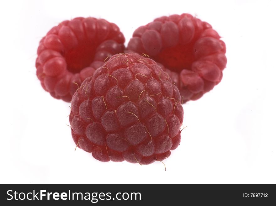 Red raspberry on the white background