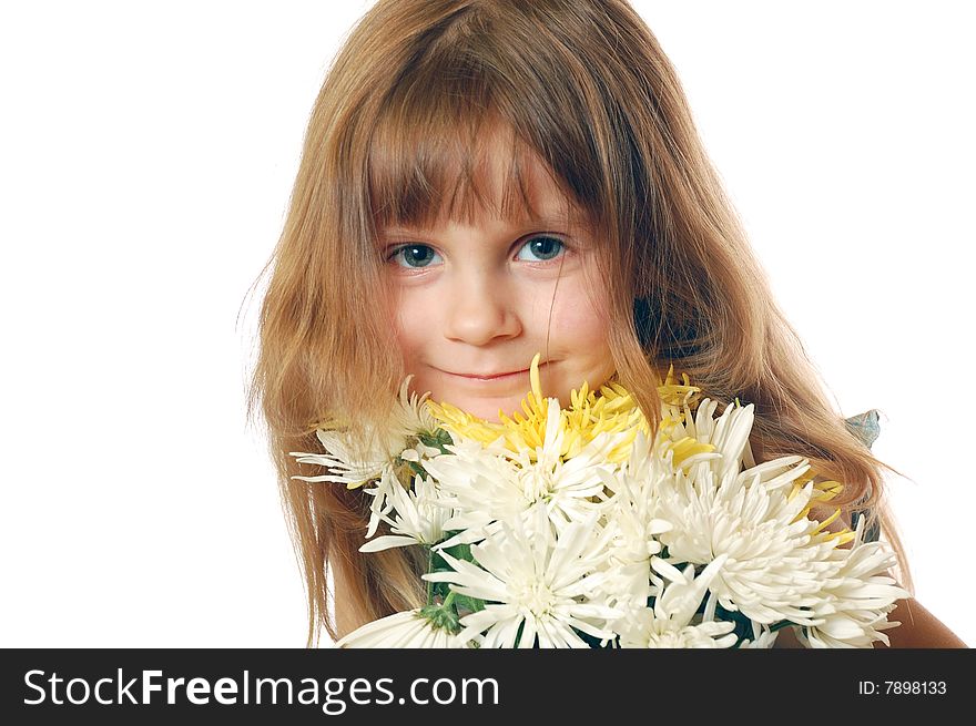 Beautiful little girl with a bunch of flowers and a pental in her lips. Copy Space. Beautiful little girl with a bunch of flowers and a pental in her lips. Copy Space.