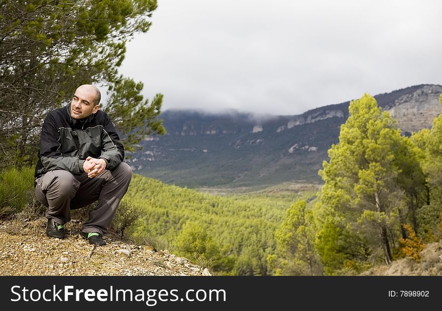 Young Man Portrait On The Nature Background