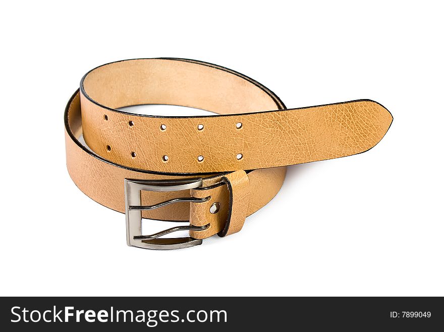 A yellow  leather belt isolated on white background. A yellow  leather belt isolated on white background