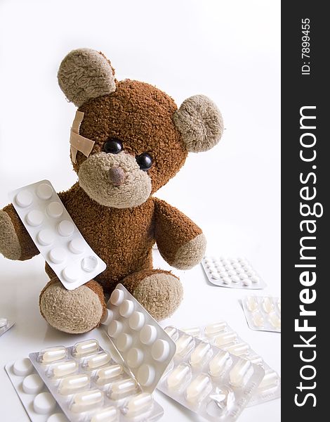 Sick Teddy Bear With Pills.